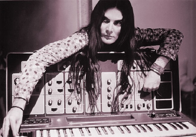Wendy Carlos, the pioneering composer who proved electronic music could be deeply emotional, seated at her recording console